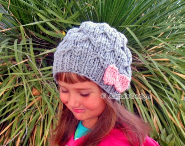 knitted grey hat with knit pink bow on side