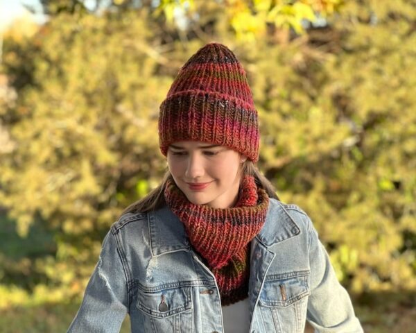 Madeline Rib Cowl Knitting Pattern shown in red with hat, front
