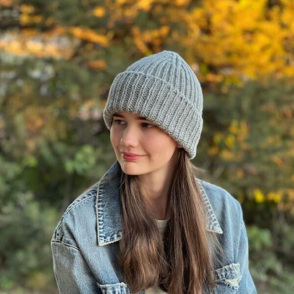 Madeline Rib Hat Knitting Pattern shown in gray, folded brim, side