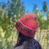 Madeline Rib Hat Knitting Pattern shown in red, side back