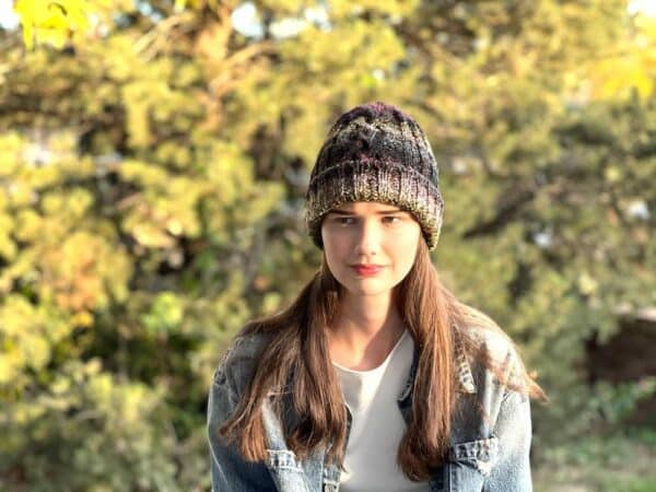 Multicolored Knitted Cable Hat shown front in black/grey/green/pink