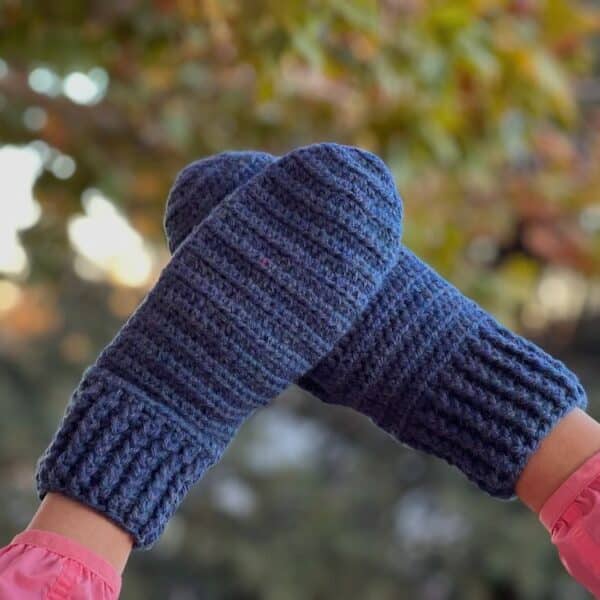 Hand Crocheted Blue Mittens, 80% acrylic and 20% wool. Shown in Large Adult Size. Mitten measures: 11.25” L x 4.5” W.