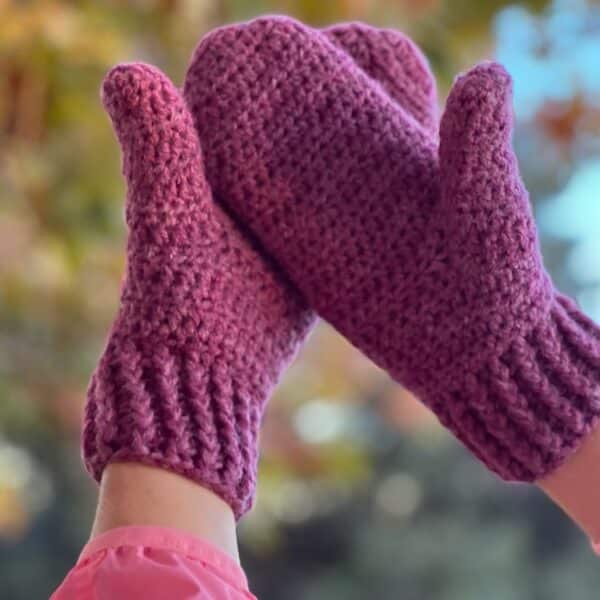Hand Crocheted Pink Mittens shown in Small Adult Size