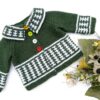 Green and White baby cardigan with colorful buttons.