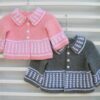 Pink and grey baby cardigans with white strips & white buttons.